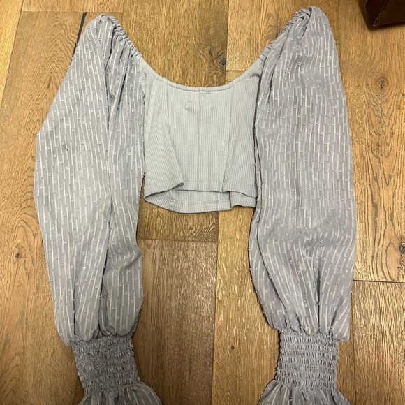 This is a size XS blue top from urban outfitters that is great and comfortable - Picture 2 of 2